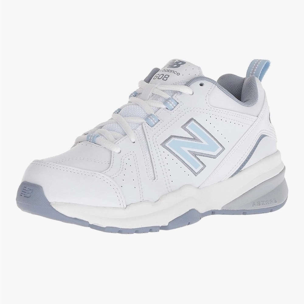 New Balance women’s White and Light Blue Sneakers 608 V5